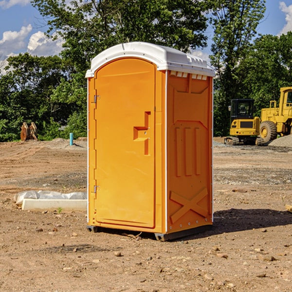 how often are the portable restrooms cleaned and serviced during a rental period in Adel